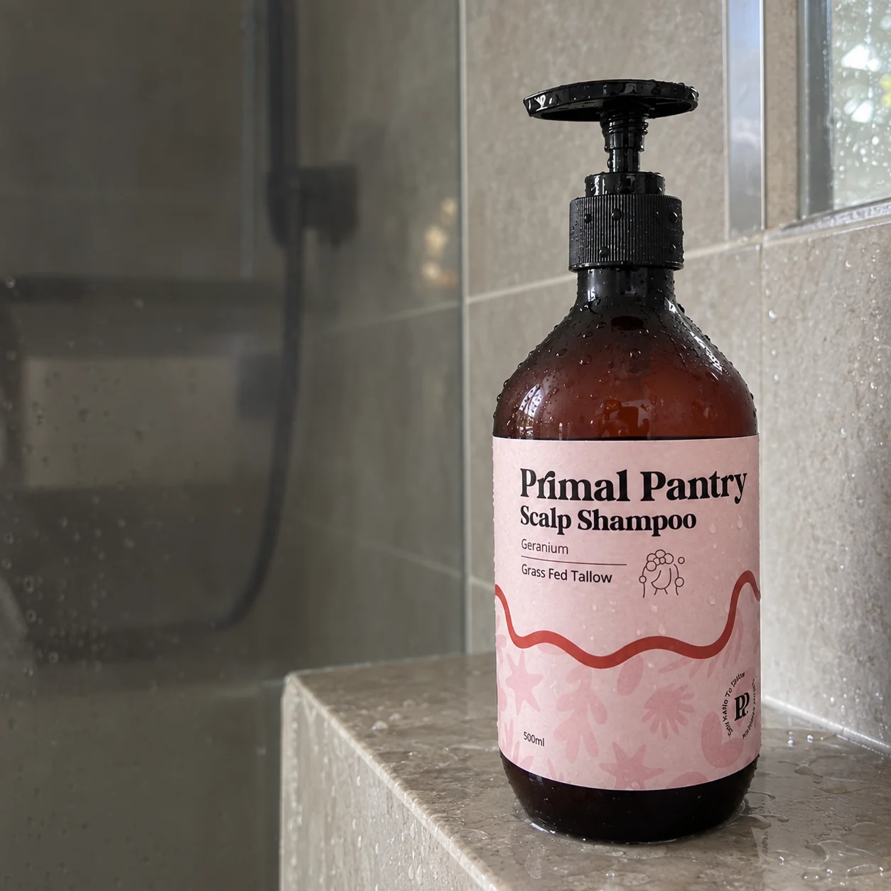 500ml liquid shampoo on a bathroom shelf beside Tyler’s scalp review